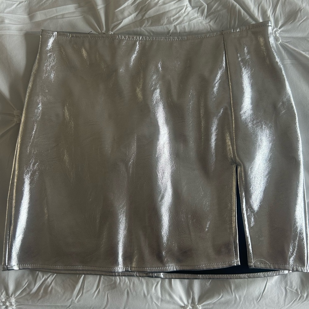 Beautiful Brand New Metallic skirt size Large.